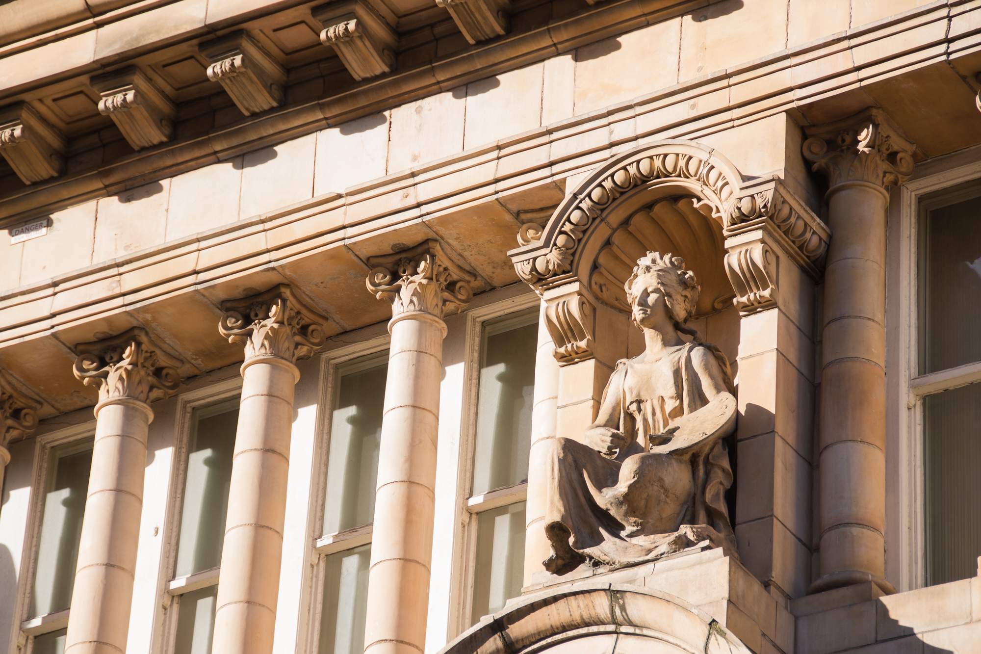 Detail of the Greek inspired frontage of the current general Newsroom -