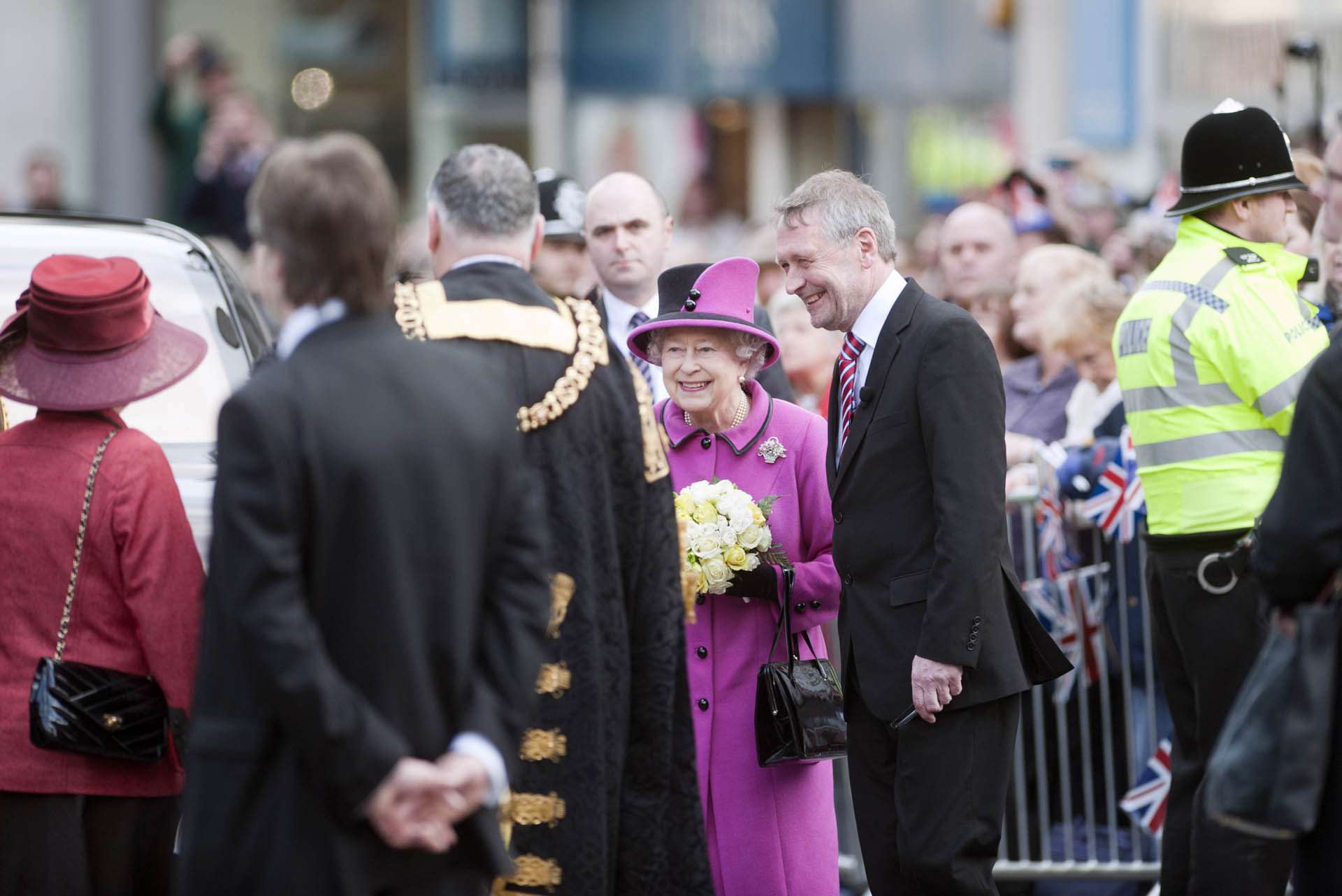 The Queen being accompanied by Sir Peter Soulsby, Leicester City Mayor on her visit in 2012 -